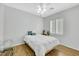 Bright bedroom features wood floors, ceiling fan and window shutters at 2485 Jade Sky St, Henderson, NV 89044