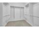 Spacious walk-in closet featuring ample shelving and rod space for organized storage at 2485 Jade Sky St, Henderson, NV 89044