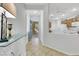 Bright entryway with tile floors and a view into the kitchen, creating an inviting and open space at 2485 Jade Sky St, Henderson, NV 89044
