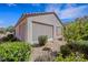 Beautiful home exterior with low-maintenance desert landscaping and mature shade trees at 2485 Jade Sky St, Henderson, NV 89044