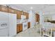 Bright kitchen featuring oak cabinets, modern appliances, and ample counter space at 2485 Jade Sky St, Henderson, NV 89044