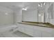 Bathroom with marble countertop, double sinks, and shower-tub combo at 249 Gentle Springs Dr, Henderson, NV 89012