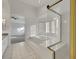 Bright bathroom featuring a garden tub and a glass-enclosed shower at 249 Gentle Springs Dr, Henderson, NV 89012