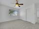 Bedroom with carpet, ceiling fan, and large closet with sliding doors at 249 Gentle Springs Dr, Henderson, NV 89012