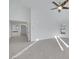 Spacious bedroom with vaulted ceiling, ceiling fan, and bathroom access at 249 Gentle Springs Dr, Henderson, NV 89012
