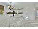 Modern kitchen features an island, granite counters, stainless steel appliances, and ample storage at 249 Gentle Springs Dr, Henderson, NV 89012