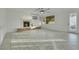 Bright living room boasts fireplace, tile flooring and natural light at 249 Gentle Springs Dr, Henderson, NV 89012