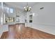 Spacious living area with hardwood floors, high ceilings, and ample natural light from large windows at 249 Gentle Springs Dr, Henderson, NV 89012