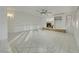 Bright living room boasts modern ceiling fan, fireplace, and tile flooring at 249 Gentle Springs Dr, Henderson, NV 89012