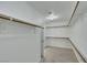 Spacious walk-in closet with ample shelving and natural light, perfect for organization and storage at 249 Gentle Springs Dr, Henderson, NV 89012