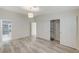 Bright, spacious bedroom showcases a large closet with sliding doors and views of the bathroom at 2633 S Durango Dr # 201, Las Vegas, NV 89117