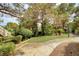 Well-maintained community grounds featuring mature trees, manicured landscaping, and walkways at 2633 S Durango Dr # 201, Las Vegas, NV 89117