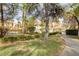 A serene view of the community pool surrounded by lush greenery and charming residential buildings at 2633 S Durango Dr # 201, Las Vegas, NV 89117