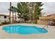 Refreshing community pool surrounded by lush landscaping and ample space for relaxation at 2633 S Durango Dr # 201, Las Vegas, NV 89117