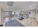 Upstairs exercise space featuring wood floors, exercise equipment, and natural light at 2637 Via Monet, Henderson, NV 89044