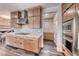 Modern kitchen with a gas cooktop, large island, stainless steel appliances and lots of cabinet space at 2637 Via Monet, Henderson, NV 89044