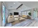 Bright living room with stylish furniture, modern decor, and ample natural light at 2637 Via Monet, Henderson, NV 89044
