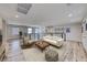 Upstairs loft with modern furniture, natural light, and railing overlooking the lower level at 2637 Via Monet, Henderson, NV 89044