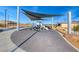 Modern park featuring a shaded play area with unique seating, nestled in desert landscaping at 2637 Via Monet, Henderson, NV 89044