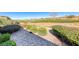 Backyard featuring desert landscaping and a view of the community and surrounding area at 2702 Grand Forks Rd, Henderson, NV 89052