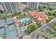 Stunning aerial view of the community pool, clubhouse, and tennis courts at 2877 Paradise Rd # 1804, Las Vegas, NV 89109