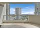 Spacious balcony featuring city views, glass railing and marble flooring at 2877 Paradise Rd # 1804, Las Vegas, NV 89109