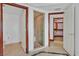 Bright bathroom with glass shower and doorways leading to toilet and closet at 2877 Paradise Rd # 1804, Las Vegas, NV 89109