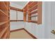 Walk-in closet with custom shelves and a closet rod for maximum storage at 2877 Paradise Rd # 1804, Las Vegas, NV 89109