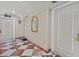 Hallway featuring patterned floors, doors to units, and an 'Exit' sign overhead at 2877 Paradise Rd # 1804, Las Vegas, NV 89109