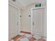 Hallway with tiled floors and neutral wall color, with doors to units at 2877 Paradise Rd # 1804, Las Vegas, NV 89109
