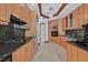 Modern kitchen with stainless steel appliances, granite countertops, and wood cabinets at 2877 Paradise Rd # 1804, Las Vegas, NV 89109