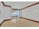 Bright living room with wood floors, wood trim, and sliding glass doors to balcony at 2877 Paradise Rd # 1804, Las Vegas, NV 89109