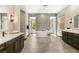 Luxury bathroom with freestanding tub, mosaic tile, dual vanities, and walk-in showers at 2927 The Peaks Ln, Las Vegas, NV 89138