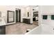 Spacious primary bathroom with dual vanities, soaker tub, and walk-in shower at 2927 The Peaks Ln, Las Vegas, NV 89138