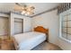 Bedroom with a view, ceiling fan, and closet space at 3108 Leafwood St, Las Vegas, NV 89108