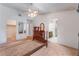 Traditional bedroom with a ceiling fan, and neutral carpeting leading to an attached bathroom and walk-in closet at 3108 Leafwood St, Las Vegas, NV 89108