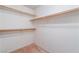 Walk-in closet featuring neutral carpet and white walls and shelving at 3108 Leafwood St, Las Vegas, NV 89108