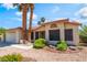 Attractive single-story home showcasing desert landscaping and a terracotta tile roof at 3108 Leafwood St, Las Vegas, NV 89108