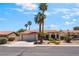Charming single-story home featuring mature landscaping, a tile roof, and a two car garage at 3108 Leafwood St, Las Vegas, NV 89108