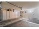 Well-organized garage with built-in storage cabinets and ample space for vehicles at 3108 Leafwood St, Las Vegas, NV 89108