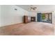 Spacious living area with fireplace and sliding glass doors to the backyard at 3108 Leafwood St, Las Vegas, NV 89108