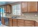 Bright kitchen features light granite countertops, stainless steel dishwasher, and generous cabinet space at 3440 Bella Viera Ct, Las Vegas, NV 89141