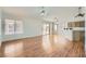 Bright living room features wood floors, large windows, and an open floor plan at 3912 Branchwood Dr, North Las Vegas, NV 89032