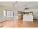 Open-concept living space with wood floors and abundant natural light at 3912 Branchwood Dr, North Las Vegas, NV 89032