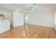 Bright living room featuring wood floors, ample lighting and open floor plan at 3912 Branchwood Dr, North Las Vegas, NV 89032