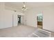 Spacious main bedroom with carpet and access to the ensuite bathroom at 3912 Branchwood Dr, North Las Vegas, NV 89032