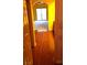 Hallway with tile floors leading to a carpeted room at 3954 Saddlewood Ct, Las Vegas, NV 89121
