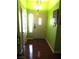 Entry way and hallway with hardwood floors and a hanging light fixture at 3954 Saddlewood Ct, Las Vegas, NV 89121
