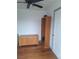 This bedroom offers hardwood floors and a ceiling fan, with ample storage in the built-in cabinet and dresser at 4284 Parkdale Ave, Las Vegas, NV 89121