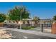 Single story home featuring RV parking, secure fencing, and xeriscaped yard at 4284 Parkdale Ave, Las Vegas, NV 89121